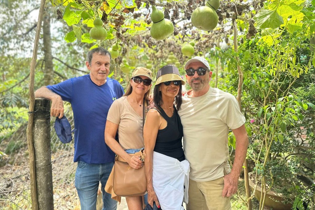 two couple visit fruit farm in ho chi minh tour package