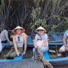 Cruise along the scenic Ham Luong River in Mekong Delta Tour 2 Days