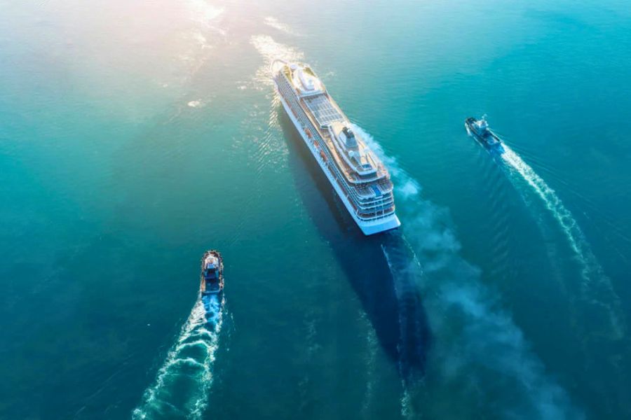 Cruise ship anchored offshore during a Southeast Asia port day