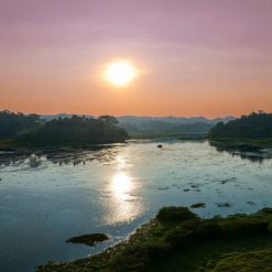 Family enjoying sunset over Ta Lai Rice Fields