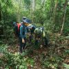 Happy family discovering wildlife at Bau Sau in Cat Tien