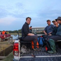 Travelers enjoying sunset over Ta Lai rice fields in Cat Tien