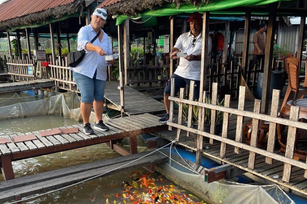 Visit fish farm in Mekong local family