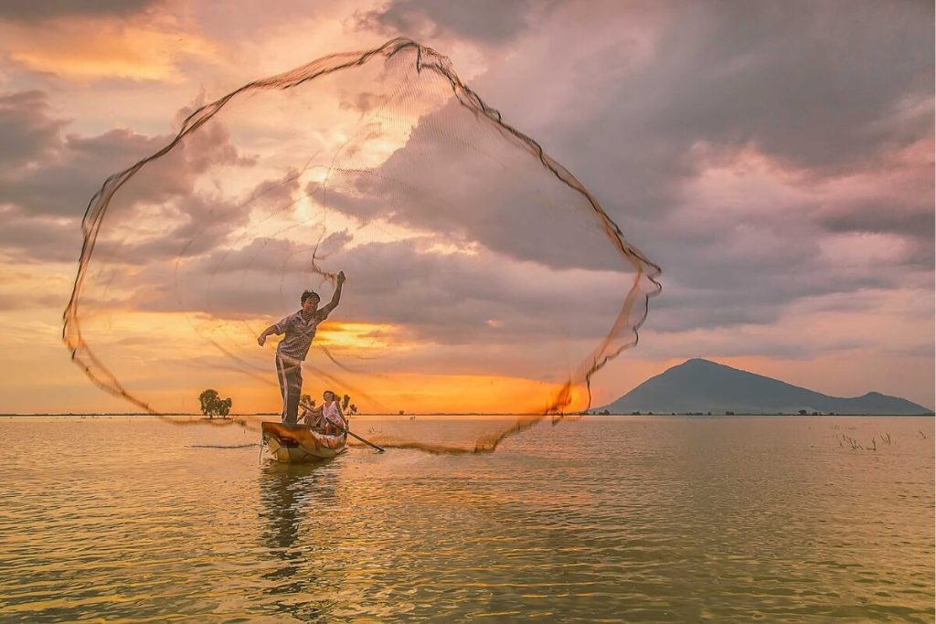 Watching sunset at Dau Tieng Lake in ho chi minh city to mekong delta tour