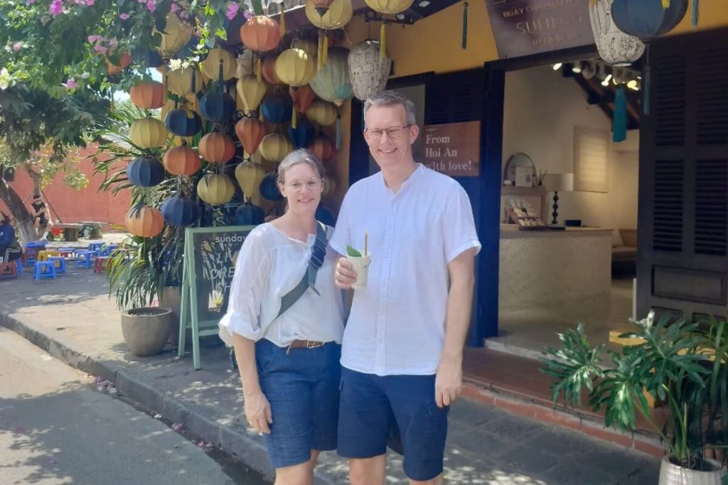 a couple visit Hoi An Ancient Town in Amazing Vietnam Tour 9 days