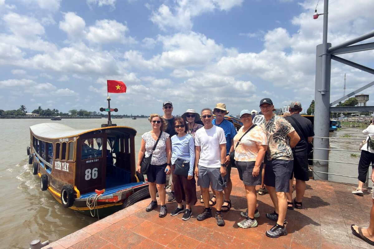 happy customer of mekong delta tour with sunset cruise