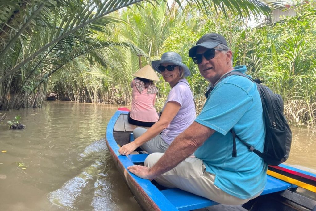 take a boat through mekong delta