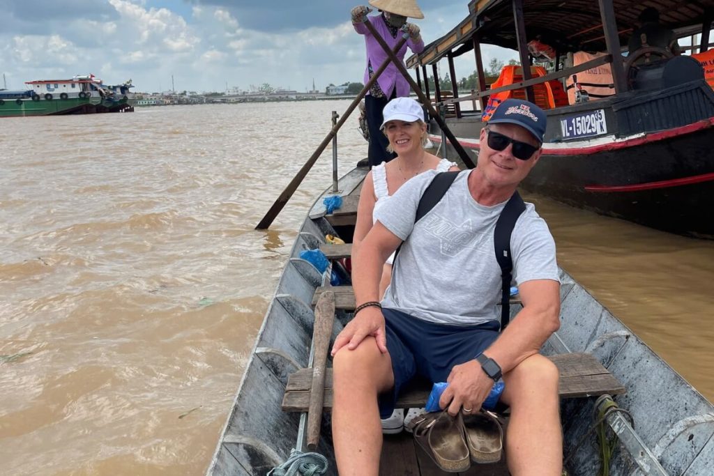 take a sampan ride through palm-shaded creeks in phu my shore excursions from ho chi minh city tour package