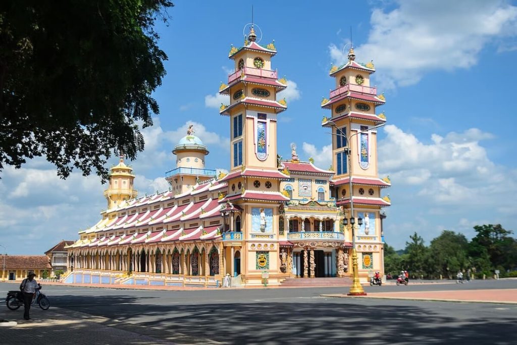visit Cao Dai Temple in mekong delta tour from ho chi minh city