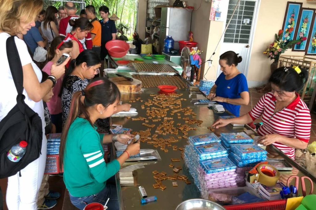 visit the coconut candy workshop in phu my shore excursions from ho chi minh city